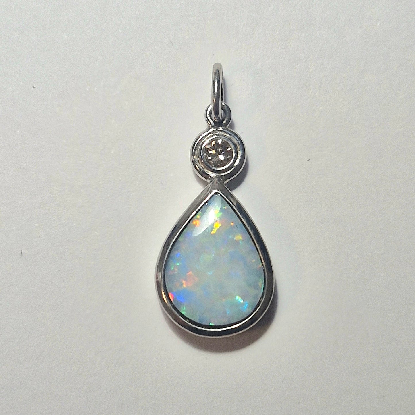 Anhänger mit Weissopal Douplette & Cognac Brillant 0.175 ct. in Silber 925, rhod.