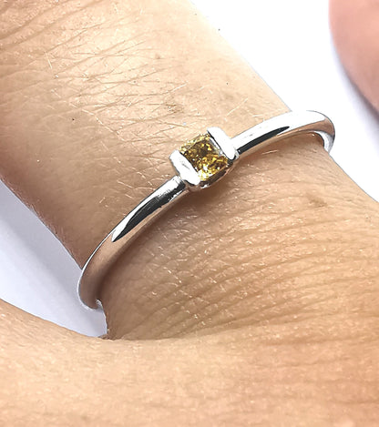 Diamond ring with natural fancy vivid yellow diamond 0.12ct.