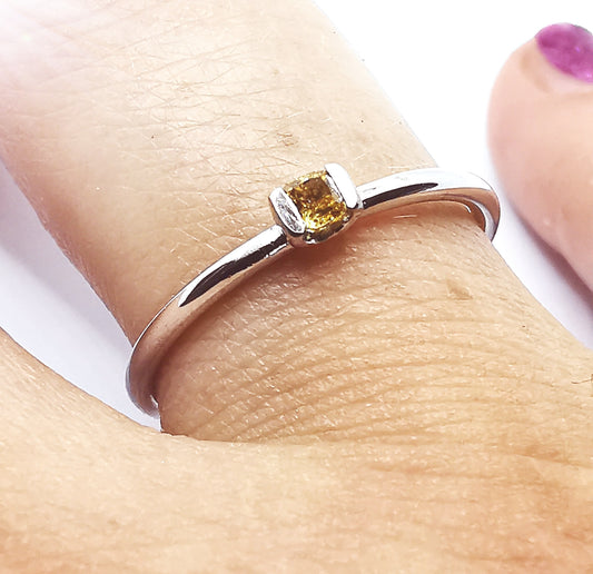 Diamond ring with natural fancy vivid yellow diamond 0.12ct.